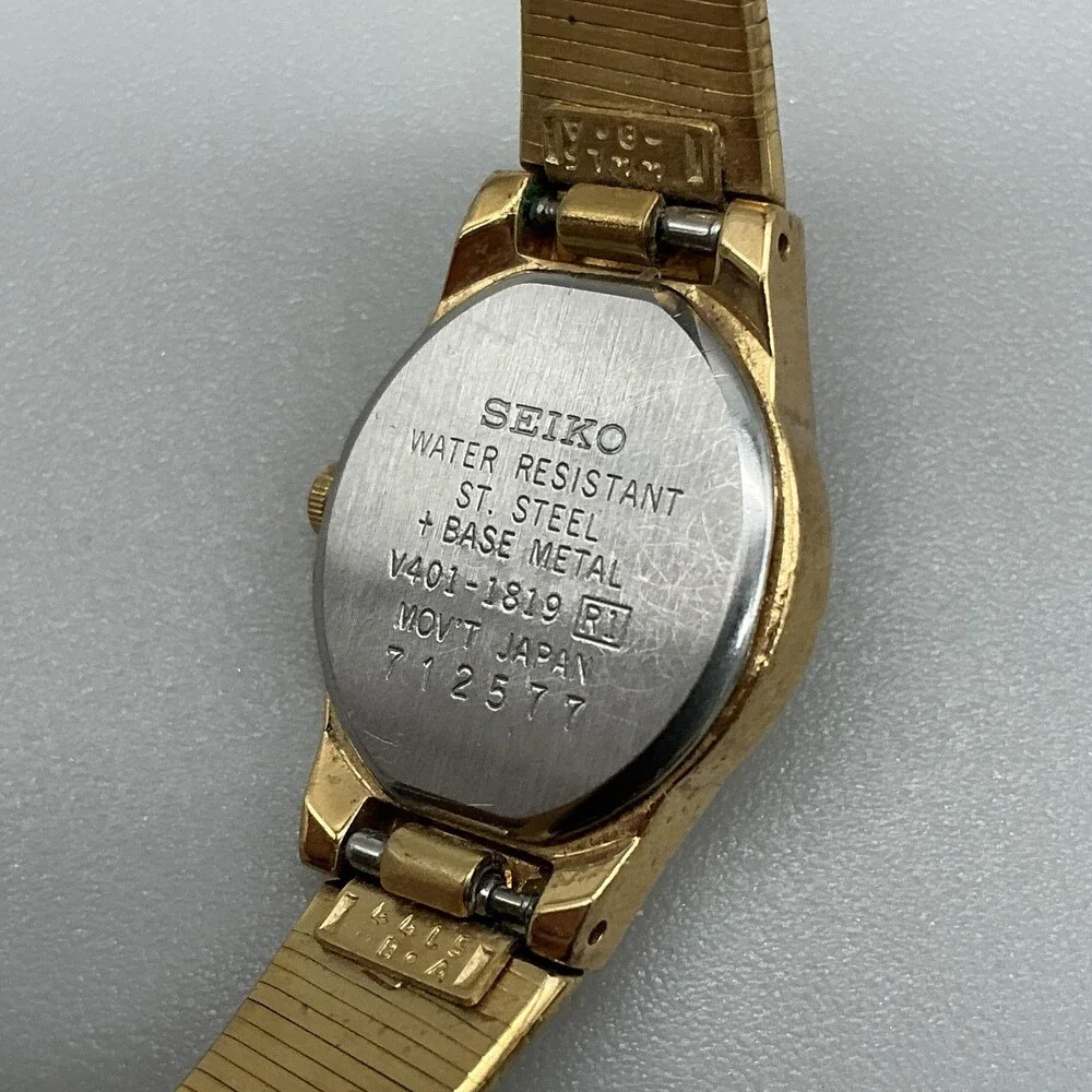 Vintage Seiko Womens Watch 18mm V401-1819 Gold Tone Safety Chain New Battery 6